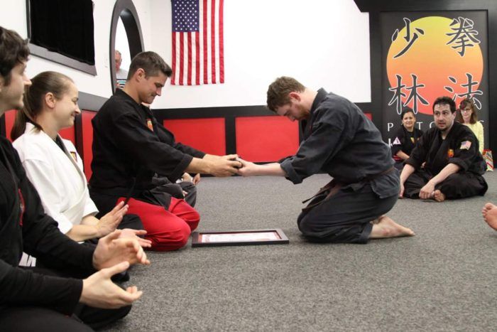Me recieving my Black belt from my Shihan