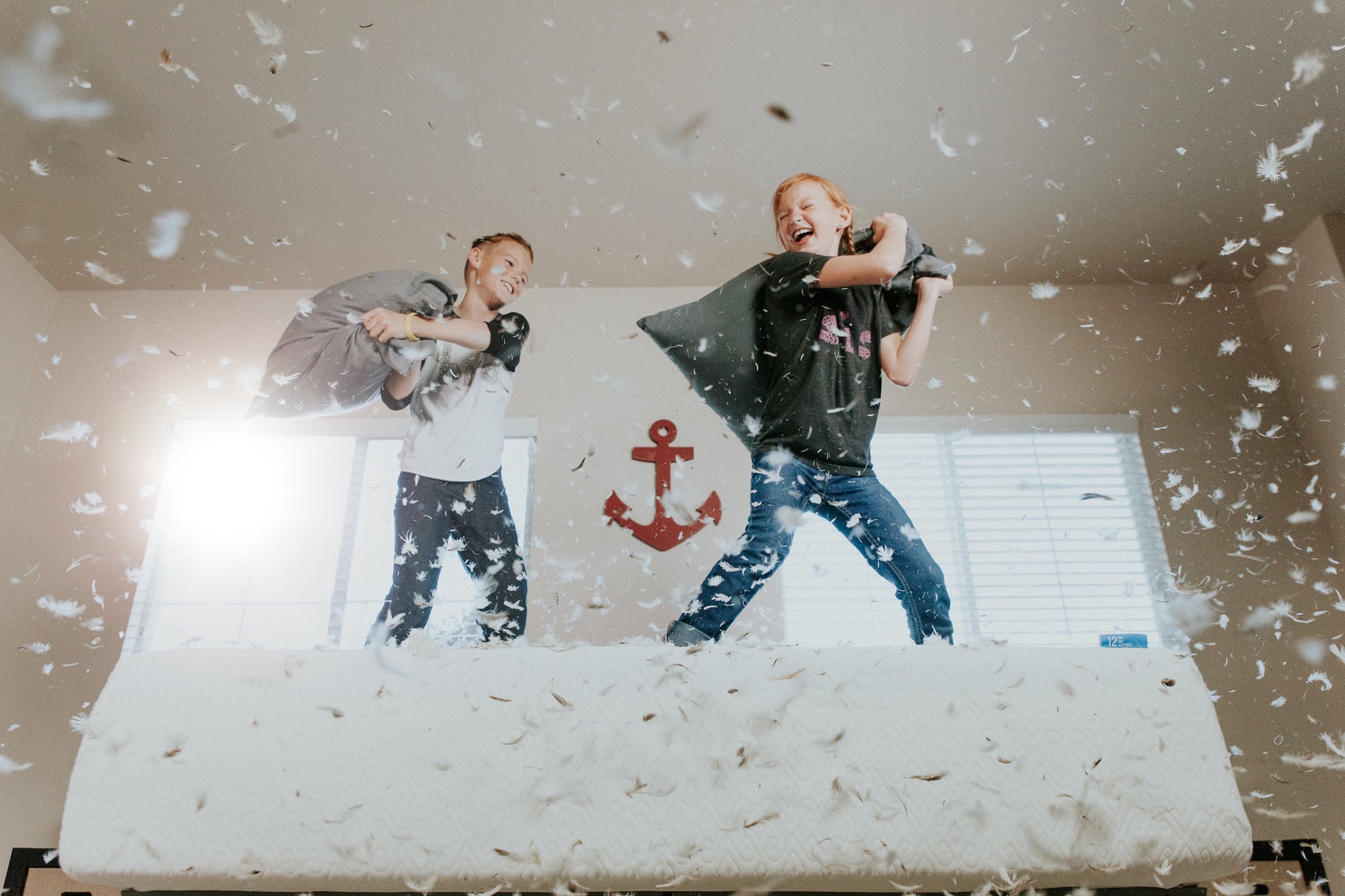 Kids having a pillow fight