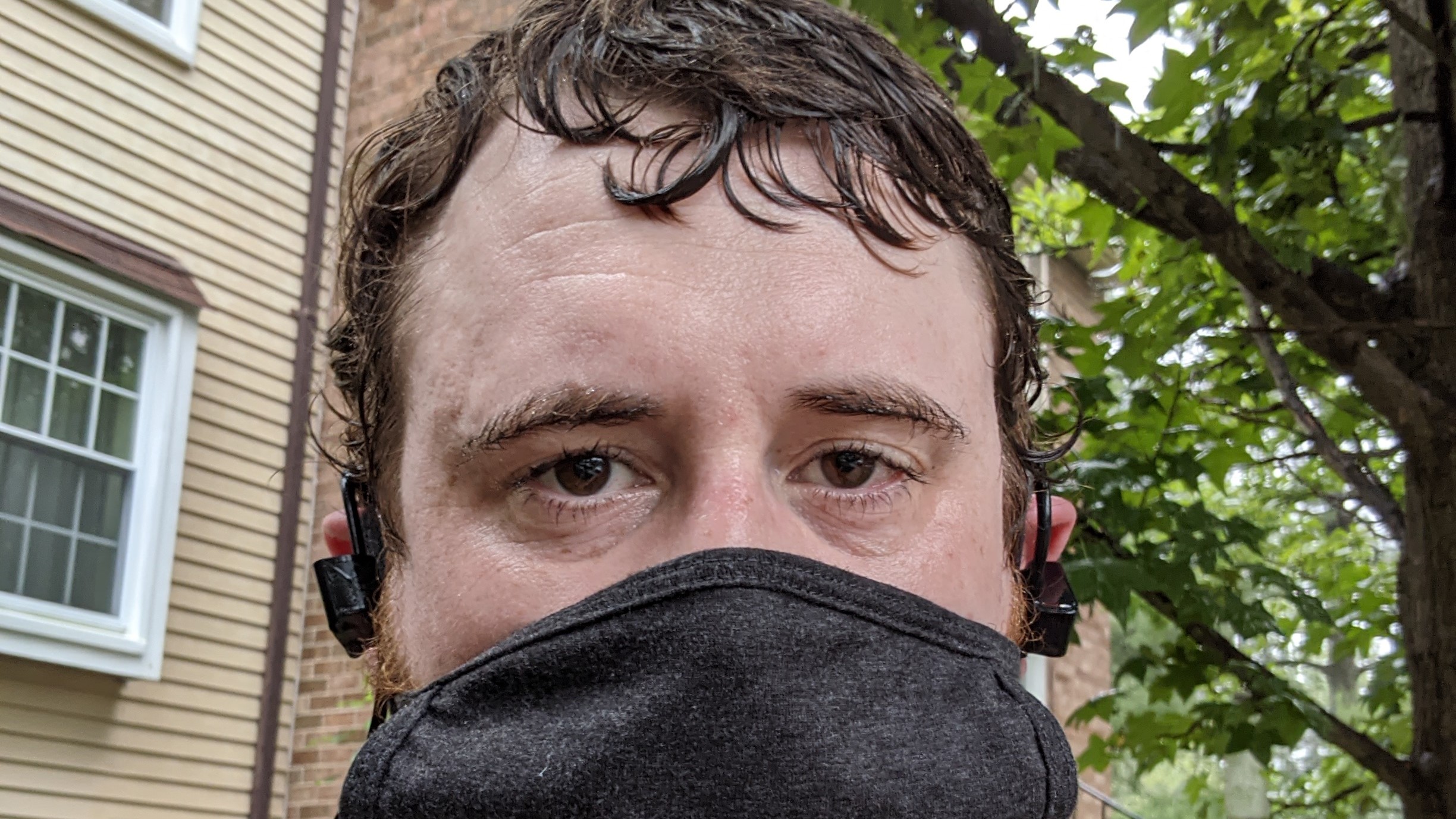 My face, masked, wet and tired